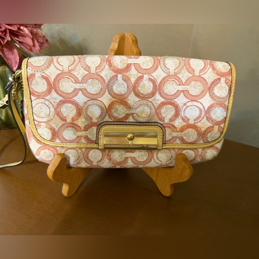 Coach Kristin Pink Patterned Clutch with Yellow Gold Trim